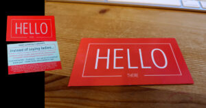 Business card on a desk: Instead of saying ladies... consider using gender inclusive language