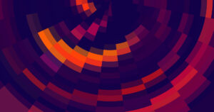 A circular array of colourful cells, ranging from purple to red, magenta and almost yellow.